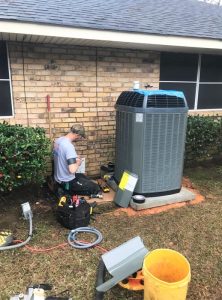 Jay installing new AC Advanced Air