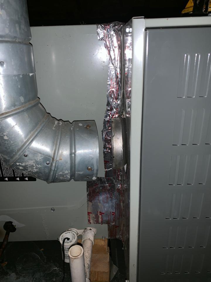 vent pipe detached from furnace that could leak carbon monoxide. Always have your furnace checked before running the heat in Shreveport bossier, Benton, and Haughton
